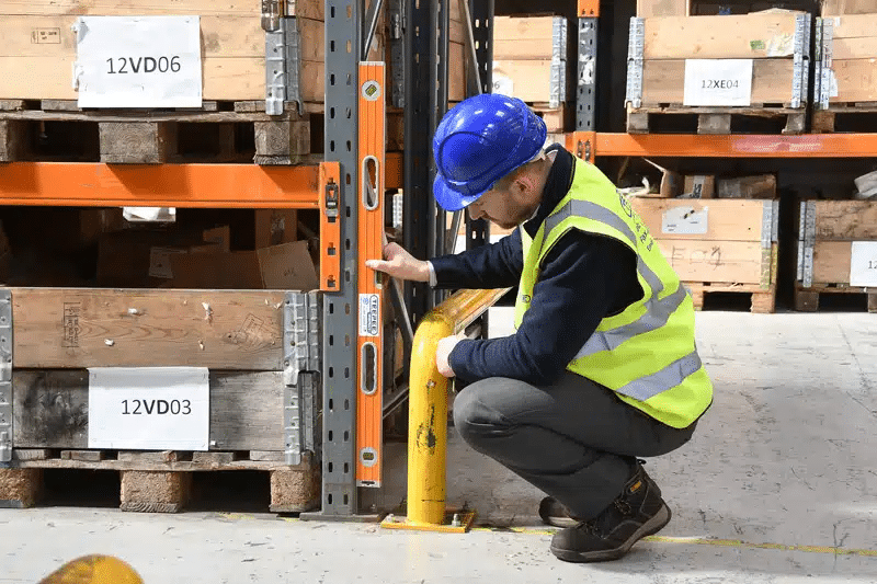 Teepee Warehouse Solutions Racking Inspection Training Courses Man inspecting shelf