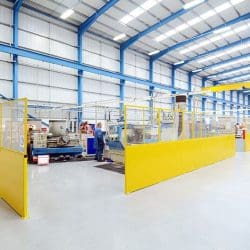 Steel partition system walls in a warehouse installed by Teepee Materials Handling