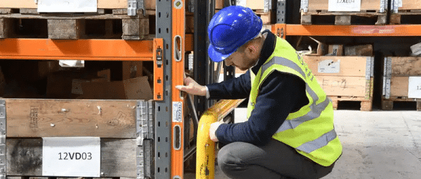 Teepee-shelving-systems Teepee employee measuring shelving systems