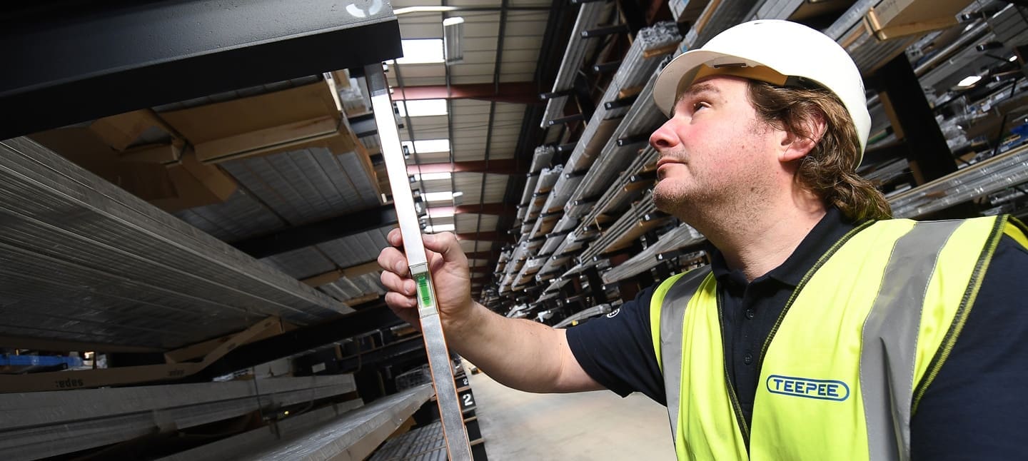 A SEMA-accredited Teepee inspector carrying out a warehouse racking inspection