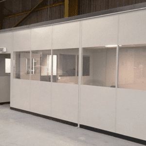 Glass office warehouse partitioning walls installed in a warehouse by Teepee Materials Handling