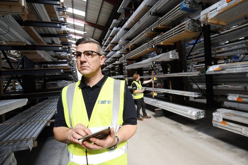 pallet-racking-inspections-teepee A Teepee SEMA approved racking inspector conducting a pallet racking inspection in a Birmingham warehouse