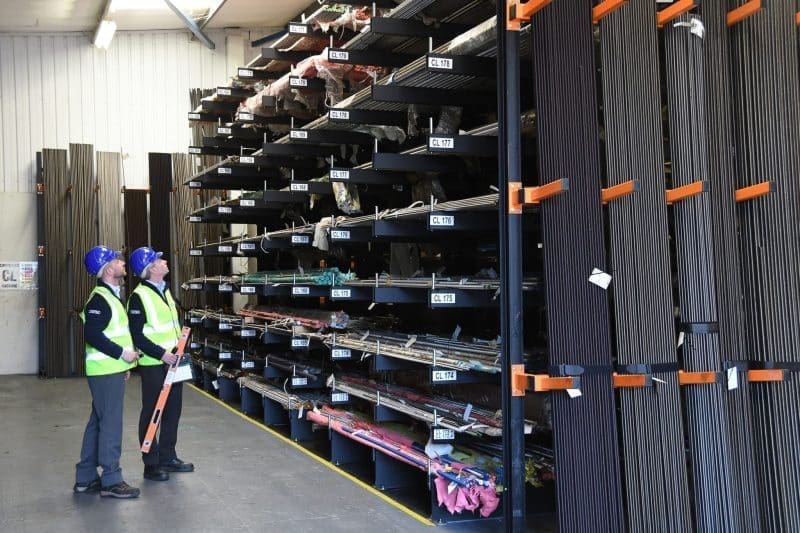 A cantilever racking inspection being performed by two Teepee Materials Handling SEMA-Approved Rack Inspectors