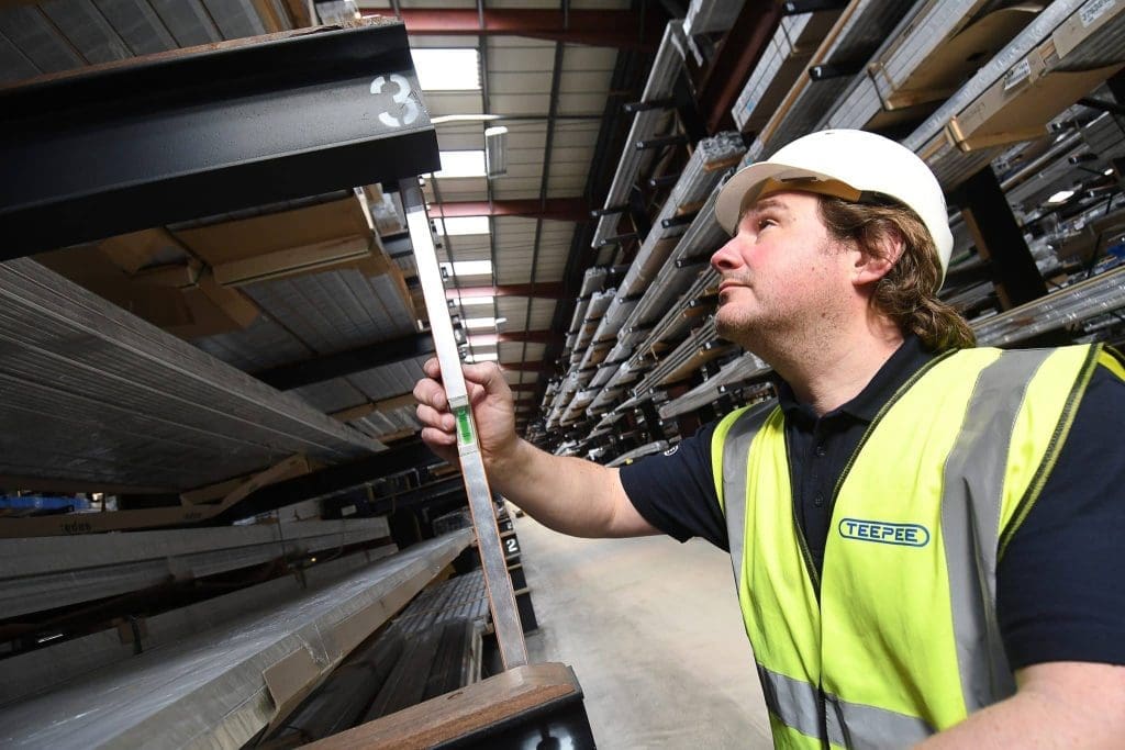 A cantilever racking inspection being performed by a Teepee Materials Handling SEMA-Approved Rack Inspector (SARI)